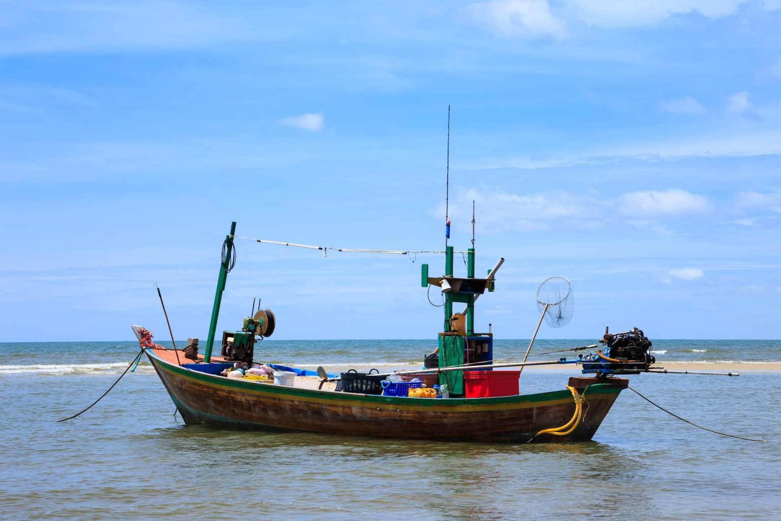 traditional-fishing-boat-by-beach (1)